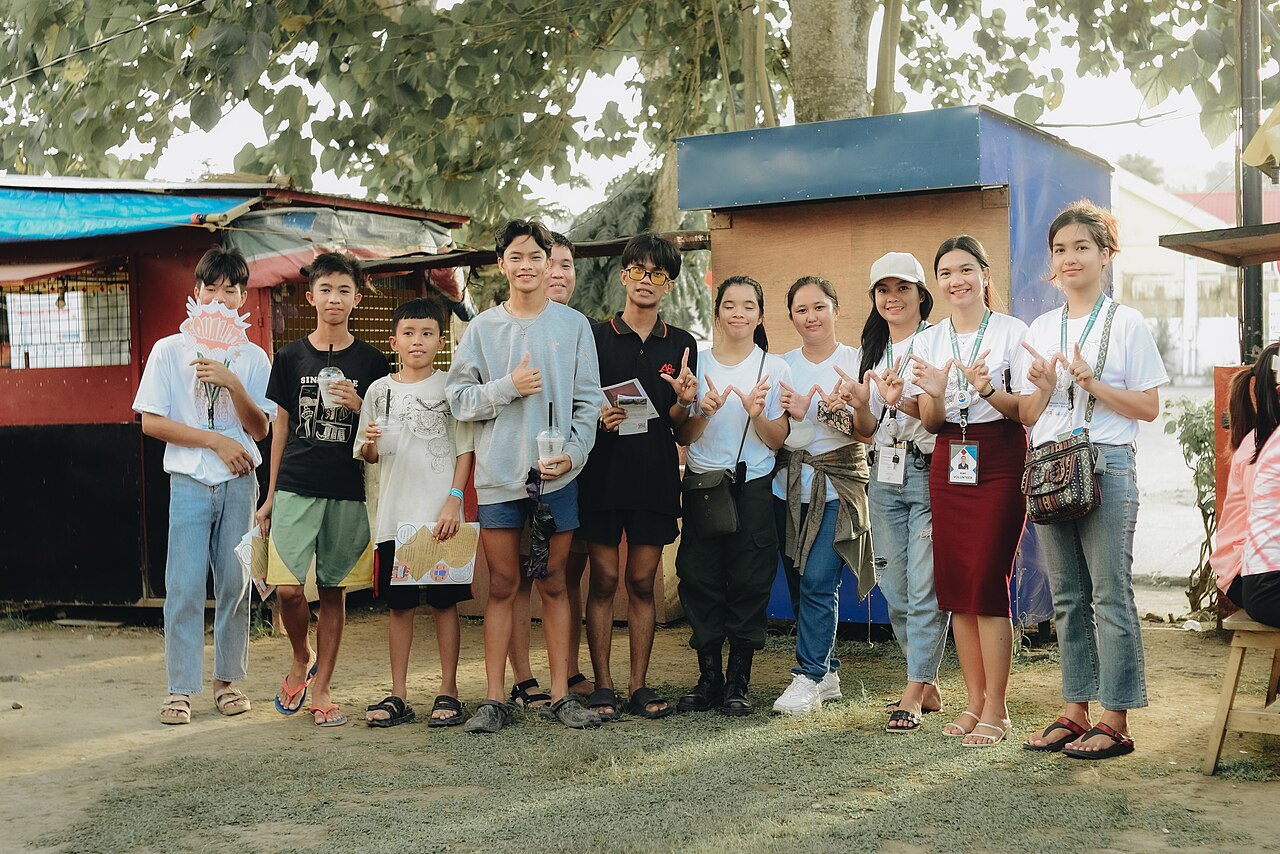 Volunteers and young people at a community event